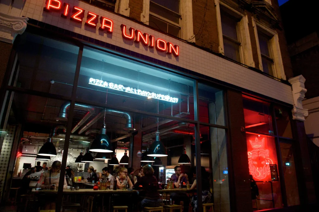 Pizza Union Kings Cross on Pentonville Road at night