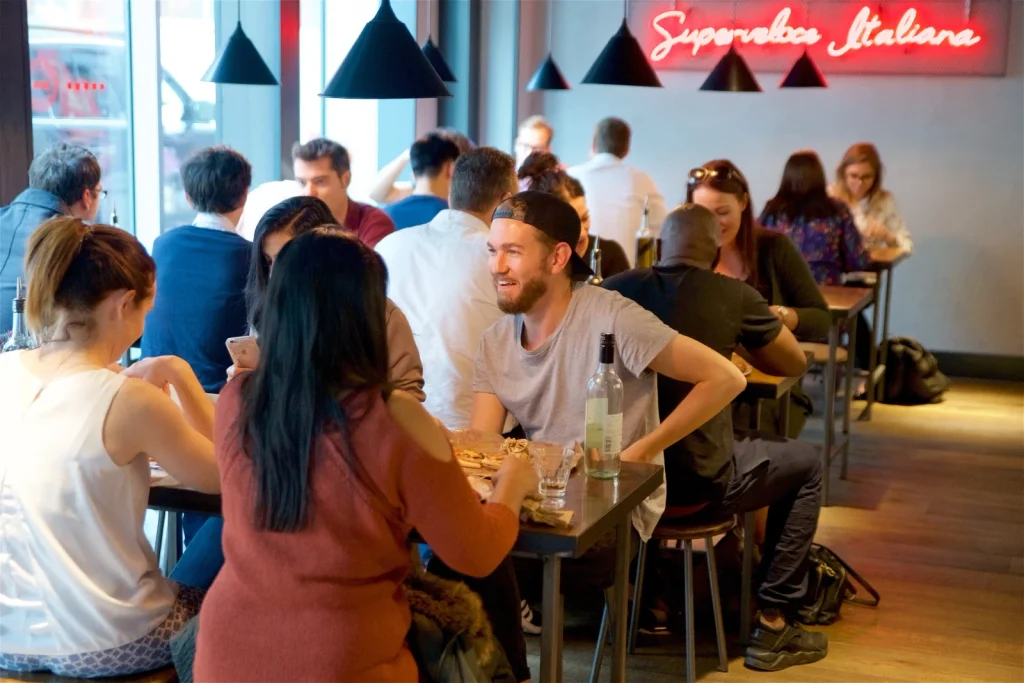 Guests eating pizza at Pizza Union